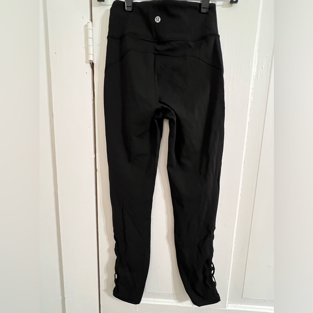 Lululemon leggings, women’s size 4, 25” inseam, cord and mesh bottom detail EUC
